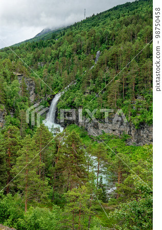 Travel destination Norway - Waterfall - Jostedalsbreen National Park 98750458