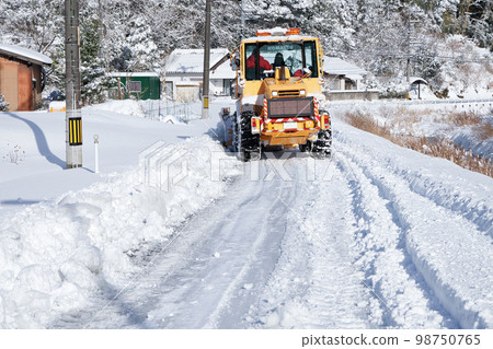 Snow removal dozer Road snow removal work in progress Snow removal dozer Road snow removal work in progress 98750765