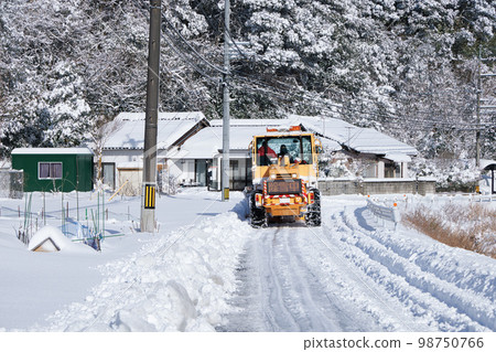 Snow removal dozer Road snow removal work in progress 98750766
