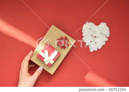 Two very beautiful Valentine's gifts, on a red background 98752244