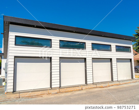 Four stall garage of a residential house under construction 98753271