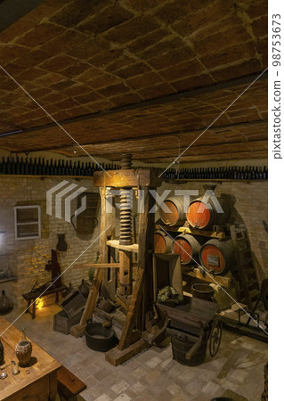 Traditional winemaking equipment in Castello di Razzano, Piedmont, Italy 98753673