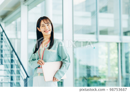Young engineer woman in the office Young engineer woman in the office 98753687