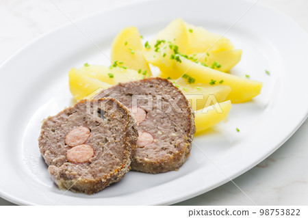 homemade meat loaf filled with sausage 98753822