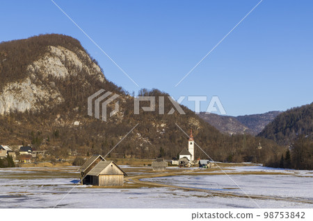 Landscape with church (Cerkev Rozenvenske Marije) near Bohinjska Bistrica, Slovenia 98753842