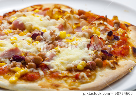 homemade pizza with bacon, corn and beans homemade pizza with bacon, corn and beans 98754603