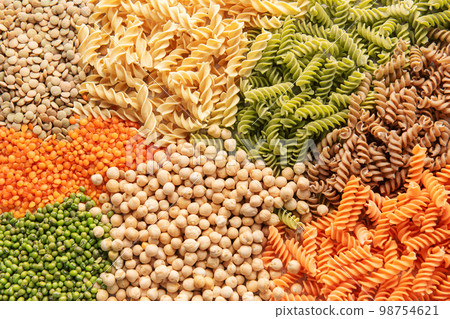 A variety of fusilli pasta from different types of legumes. Gluten-free pasta. A variety of fusilli pasta from different types of legumes. Gluten-free pasta. 98754621