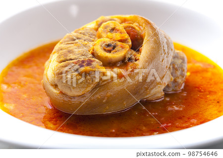 osso buco in tomato sauce osso buco in tomato sauce 98754646