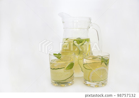 Lemon and cucumber with ice. isolate. copy space Lemon and cucumber with ice. isolate. copy space 98757132