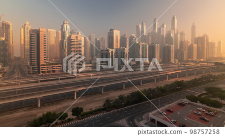 Dubai marina tallest block of skyscrapers morning . 98757258