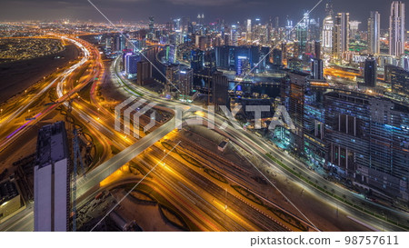 Panorama showing skyline of Dubai with business bay and downtown district night . Panorama showing skyline of Dubai with business bay and downtown district night . 98757611