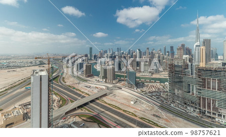 Panorama showing skyline of Dubai with business bay and downtown district . Panorama showing skyline of Dubai with business bay and downtown district . 98757621