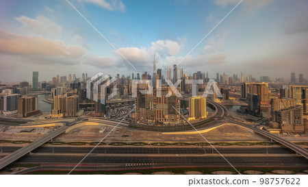 Panoramic skyline of Dubai with business bay and downtown district morning . 98757622