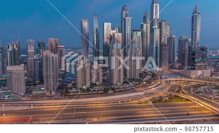 Dubai Marina highway intersection spaghetti junction night to day Dubai Marina highway intersection spaghetti junction night to day 98757715