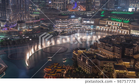 Dubai Fountain aerial night . Musical fountain, located in an artificial lake in downtown 98757778