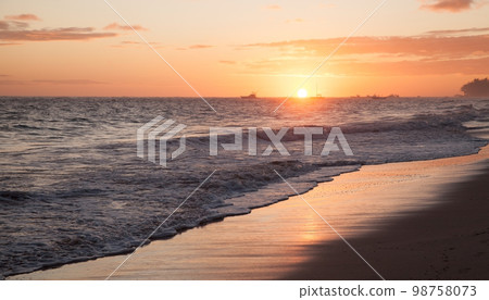 Sunrise sky over Atlantic ocean. Dominican republic Sunrise sky over Atlantic ocean. Dominican republic 98758073