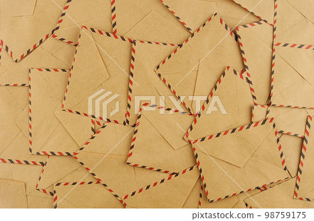Background from a large number of postal envelopes, top view Background from a large number of postal envelopes, top view 98759175