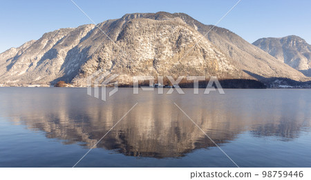 Hallstatt. Scenic view of the snow-capped mountains on a sunny morning. Hallstatt. Scenic view of the snow-capped mountains on a sunny morning. 98759446