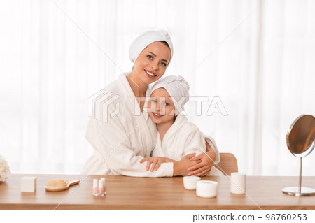 Beauty Portrait Of Happy Young Mom And Daughter In Bathrobes And Towels 98760253