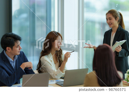 Group of Business people and Accountant checking data document on digital tablet for investigation of corruption account. Anti Bribery concept. 98760371