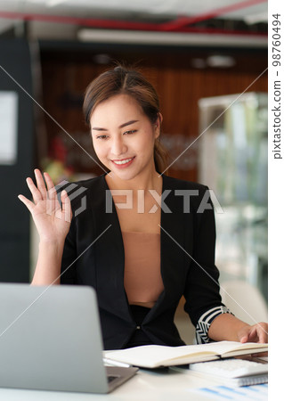 Beautiful asian woman using video call application. blogger, video conference, comfortable usage concept. Beautiful asian woman using video call application. blogger, video conference, comfortable usage concept. 98760494