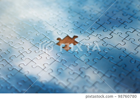 The last piece of jigsaw puzzle concept for solutions and completion The last piece of jigsaw puzzle concept for solutions and completion 98760780