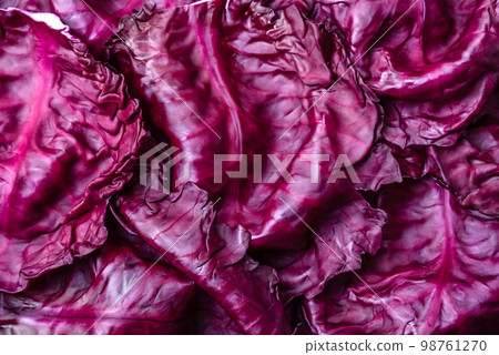Fresh beautiful red cabbage with textured leaves on a dark concrete background 98761270