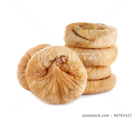 Pile of tasty dried figs isolated on white Pile of tasty dried figs isolated on white 98761427