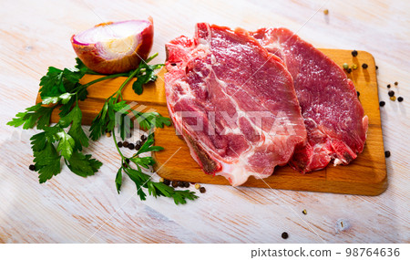 Raw pork chop 98764636