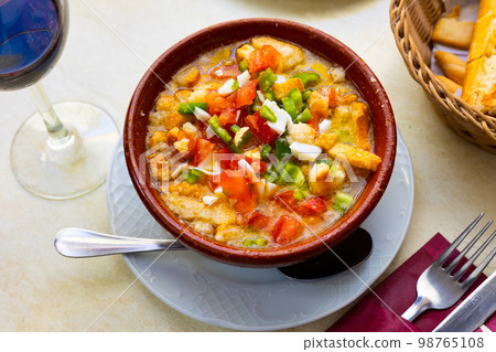 Typical summer dish Cojondongo from Extremadura in earthenware bowl Typical summer dish Cojondongo from Extremadura in earthenware bowl 98765108