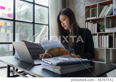 Stressed overwhelmed business person feels tired at corporate meeting, stress at work or migraine concept 98767541