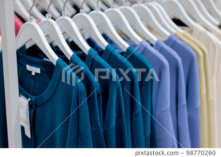 Apparel store clothes on display 98770260