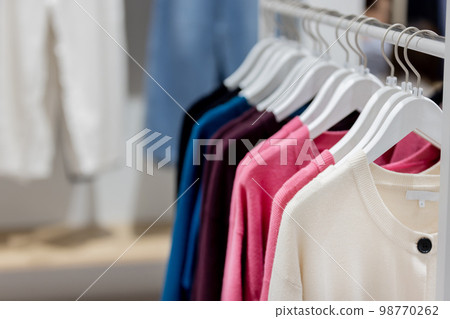 Apparel store clothes on display 98770262