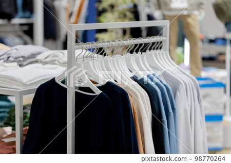 Apparel store clothes on display 98770264