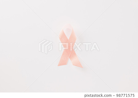 Close up pink awareness ribbon of International World Cancer Day campaign isolated on white background with copy space, concept of medical and health care support, 4 February Close up pink awareness ribbon of International World Cancer Day campaign isolated on white background with copy space, concept of medical and health care support, 4 February 98771575