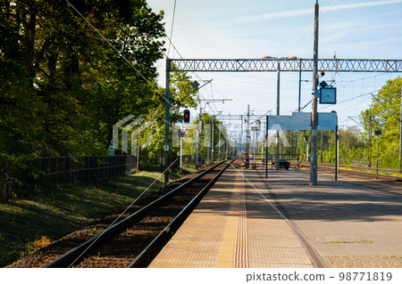 Railway station. The way forward railway for train. Empty Railway track for locomotive. Transportation system Nature background around. travel Railway station. The way forward railway for train. Empty Railway track for locomotive. Transportation system Nature background around. travel 98771819
