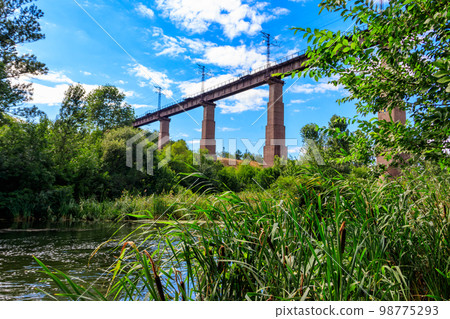 Railway Bridge viaduct across the Inhulets river in Kryvyi Rih, Ukraine 98775293