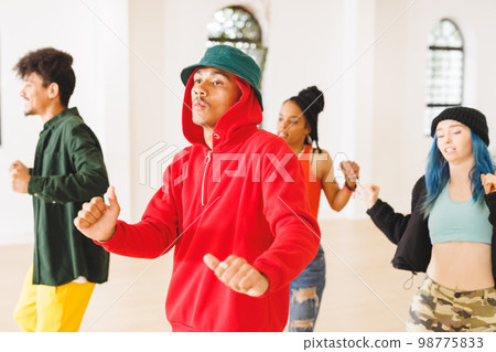 Image of low section of group of group of diverse female and male hip hop dancers in studio Image of low section of group of group of diverse female and male hip hop dancers in studio 98775833