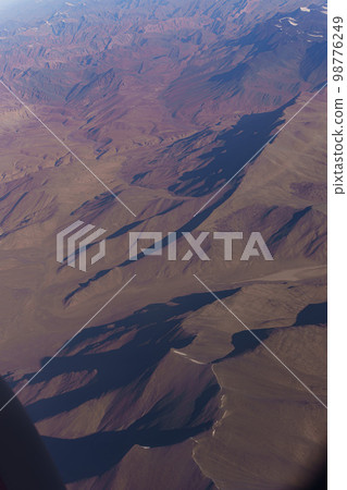 View from the plane to the surface of the earth with a mountain landscape of the Himalayas at Ladakh, India 98776249