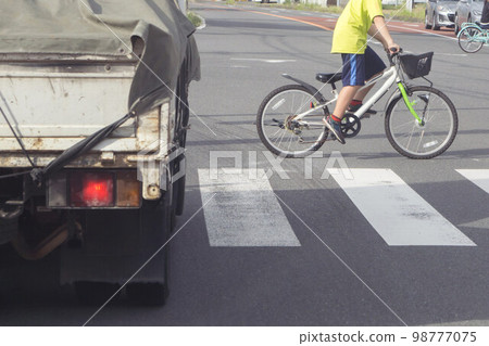 Crosswalk bicycle 98777075