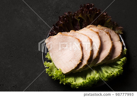 Delicious sliced ham with lettuce 98777993