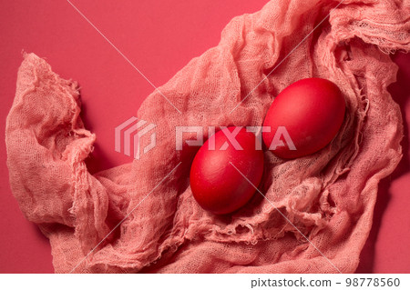 eggs on pink gauze on a pink background 98778560