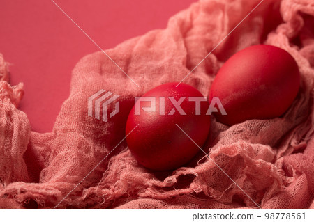 Pink chicken eggs on pink gauze 98778561