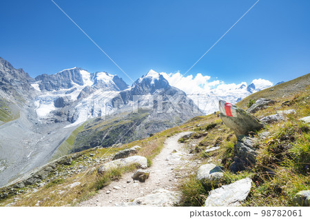Marked trail in the Swiss Alps 98782061
