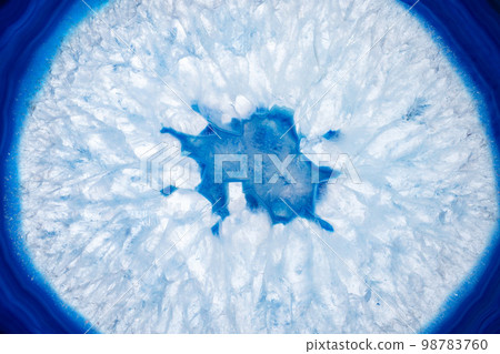Amazing blue agate cut cross section. Natural crystal mineral formation. Beautiful texture macro photo background of precious stone Amazing blue agate cut cross section. Natural crystal mineral formation. Beautiful texture macro photo background of precious stone 98783760
