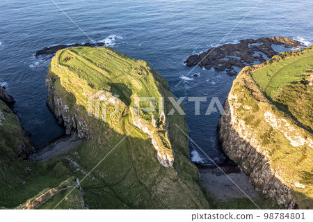 Dunseverick Castle is located west of the village of Dunseverick, in County Antrim, in Northern Ireland. Dunseverick Castle is located west of the village of Dunseverick, in County Antrim, in Northern Ireland. 98784801