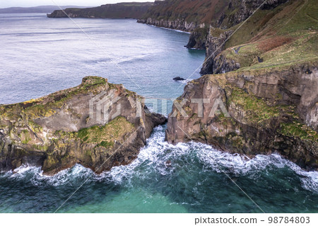 Aerial view of Ballintoy Harbour near Giants Causeway, County. Antrim, Northern Ireland, UK Aerial view of Ballintoy Harbour near Giants Causeway, County. Antrim, Northern Ireland, UK 98784803