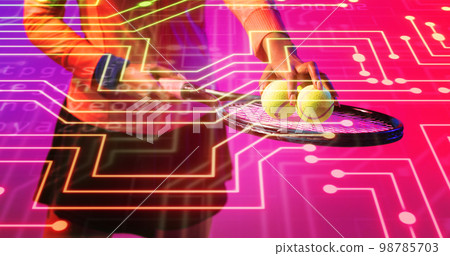 Midsection of biracial female tennis player holding balls and racket over connected dots 98785703