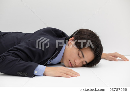 Fatigue anemia collapsing businessman Fatigue anemia collapsing businessman 98787966