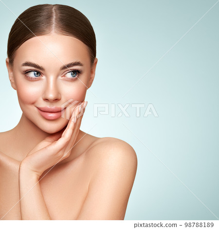 Portrait beautiful young woman with clean fresh skin Portrait beautiful young woman with clean fresh skin 98788189